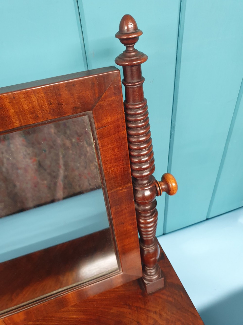 A 19th-century rectangular mahogany dressing mirror with turned side posts resting on a flat plinth base. View IV