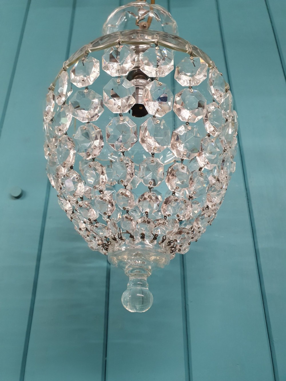 An early 20th-century crystal dome top pendant chandelier with faceted glass beads and a brass chain suspension. View IV