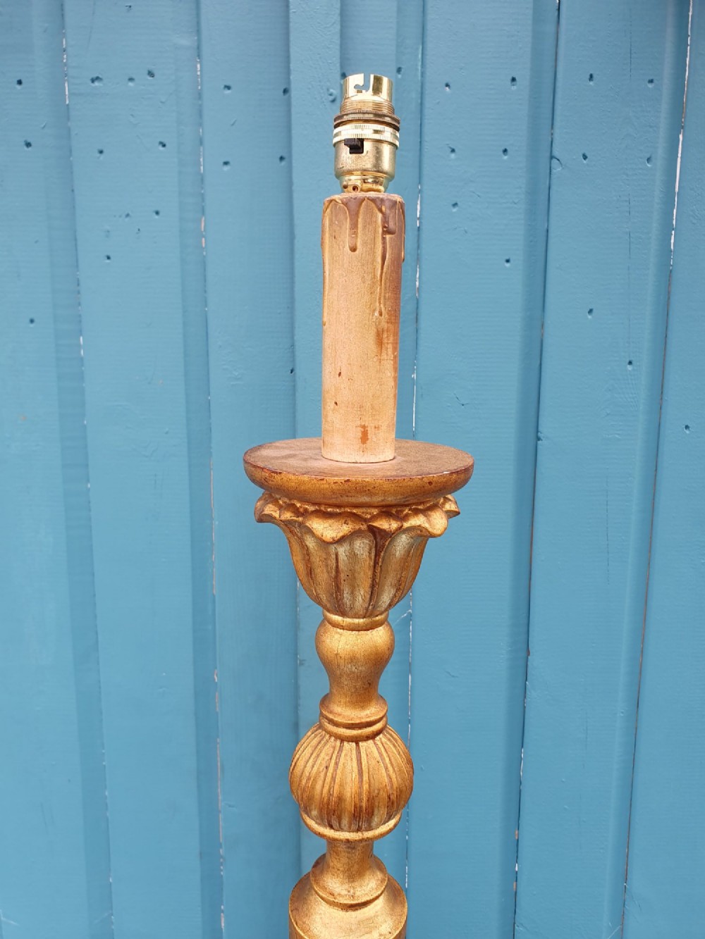 A late nineteenth-century carved giltwood standard lamp featuring a fluted column, ornamental knops, and a scroll-carved tripod base. View III