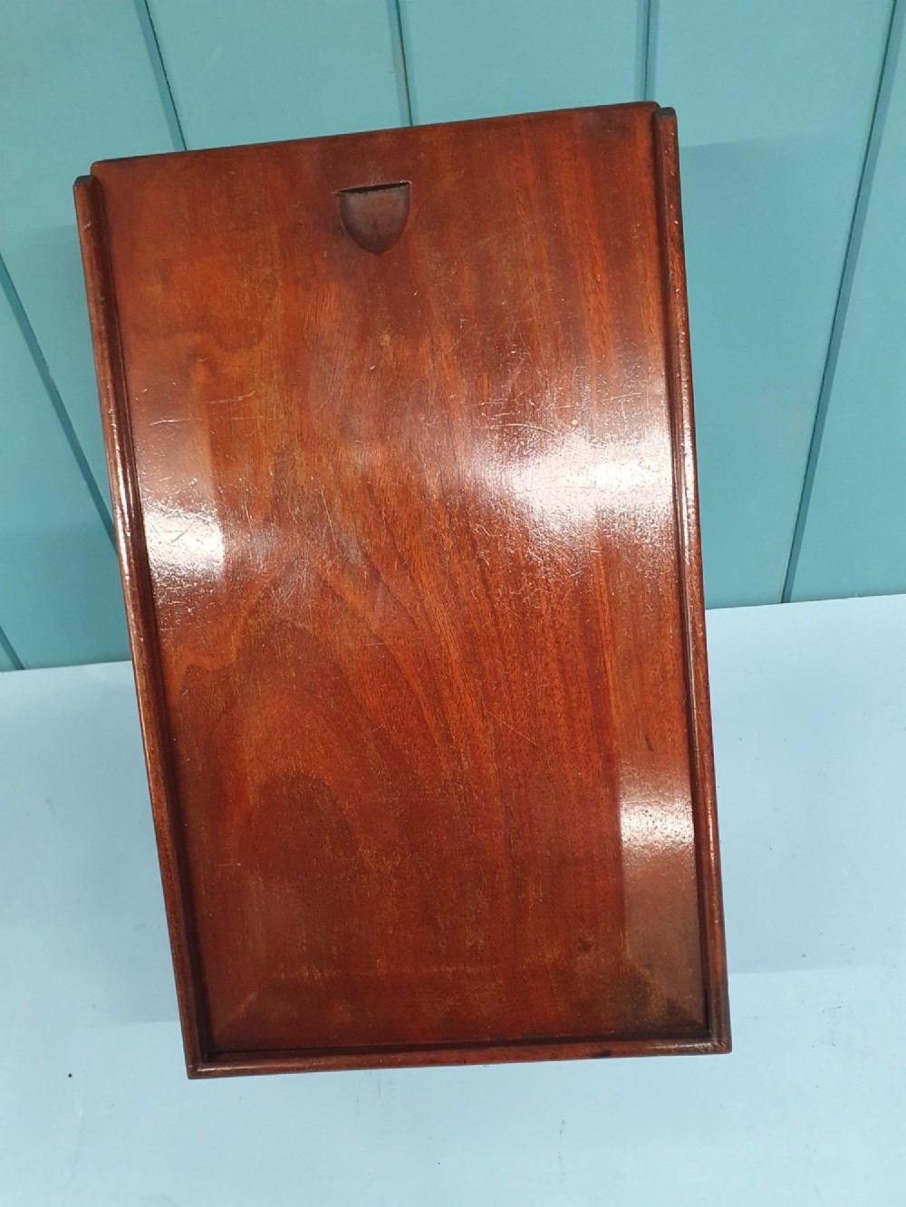 A rectangular Georgian mahogany document box featuring a sliding lid mechanism and warm brown wood grain finish. View VII