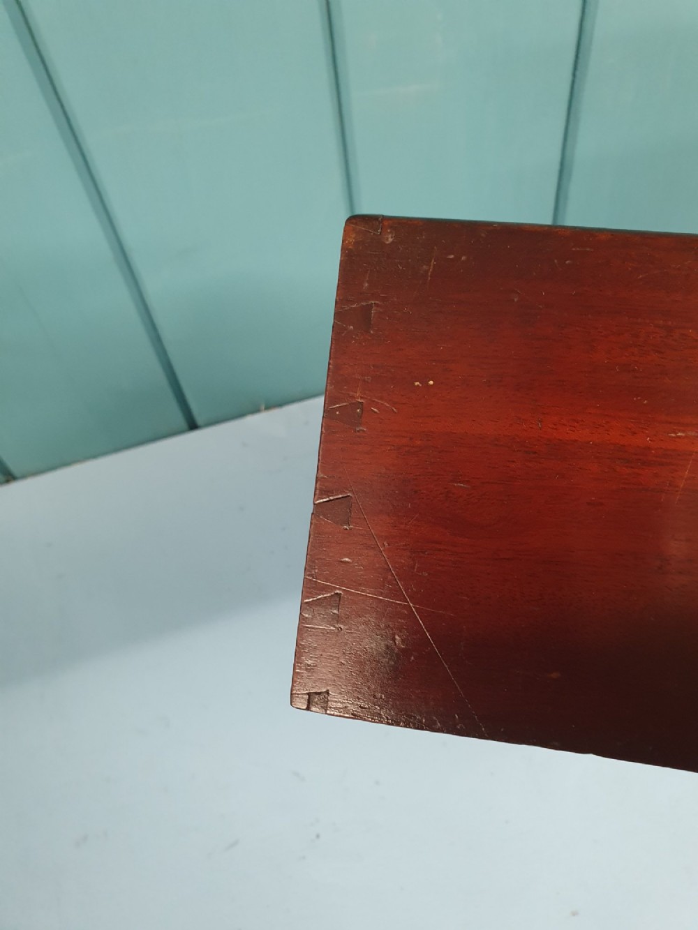 A rectangular Georgian mahogany document box featuring a sliding lid mechanism and warm brown wood grain finish. View VIII