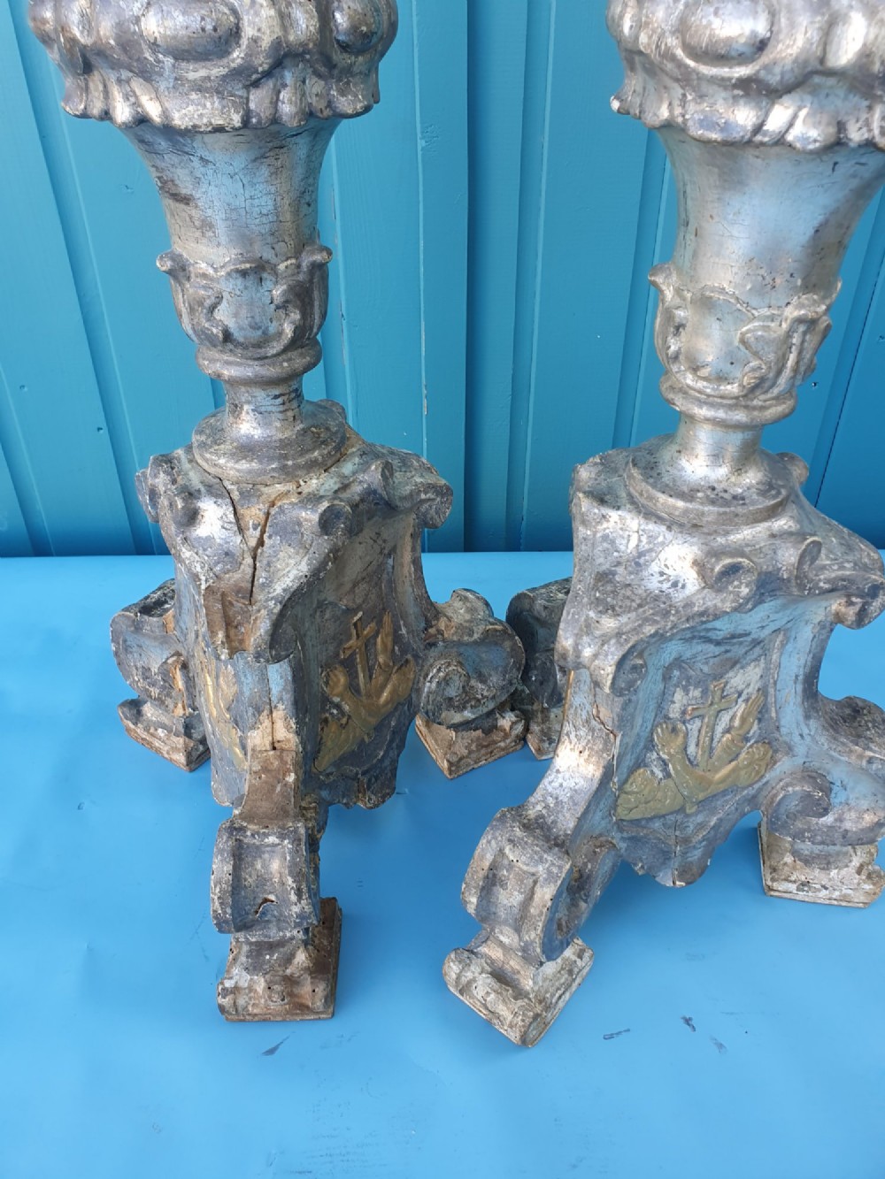 Pair of tall 18th-century Rococo gilt-silver pricket candlesticks with carved baluster shafts and scrolled triangular bases. View IV