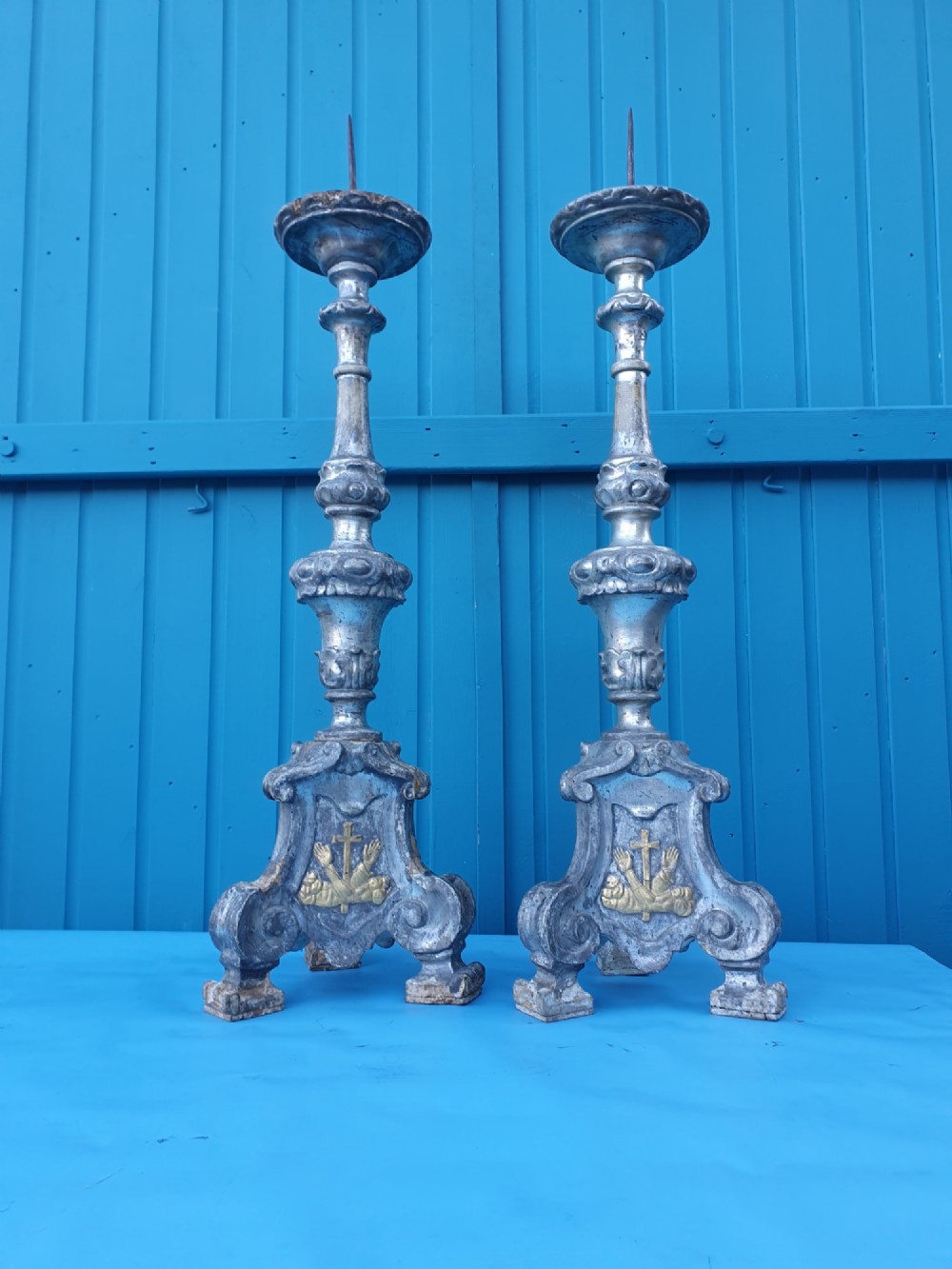 Pair of tall 18th-century Rococo gilt-silver pricket candlesticks with carved baluster shafts and scrolled triangular bases. View VII