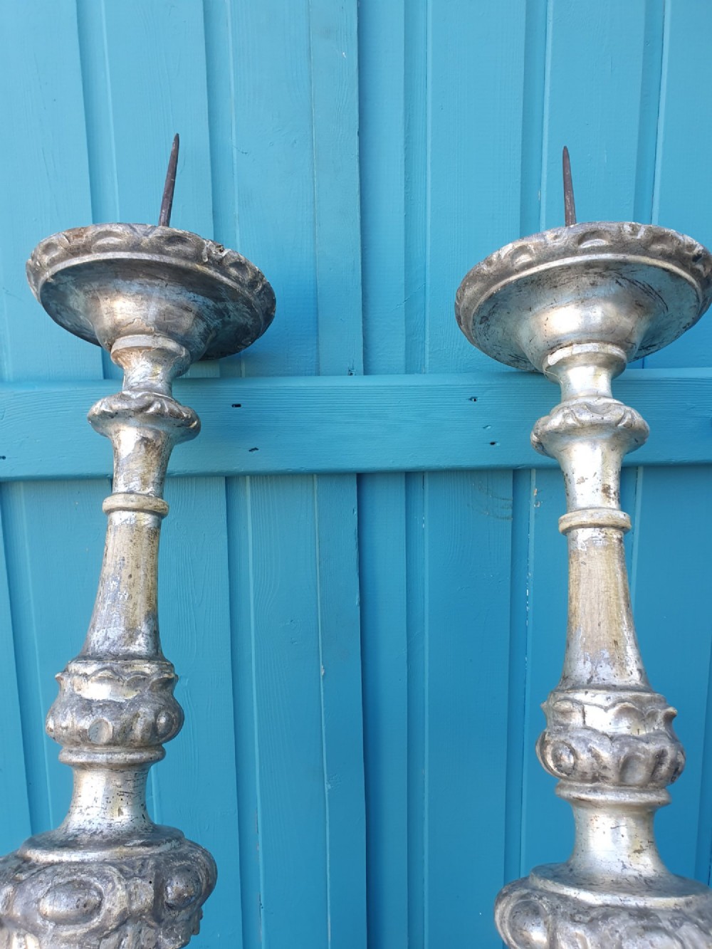 Pair of tall 18th-century Rococo gilt-silver pricket candlesticks with carved baluster shafts and scrolled triangular bases. View VIII