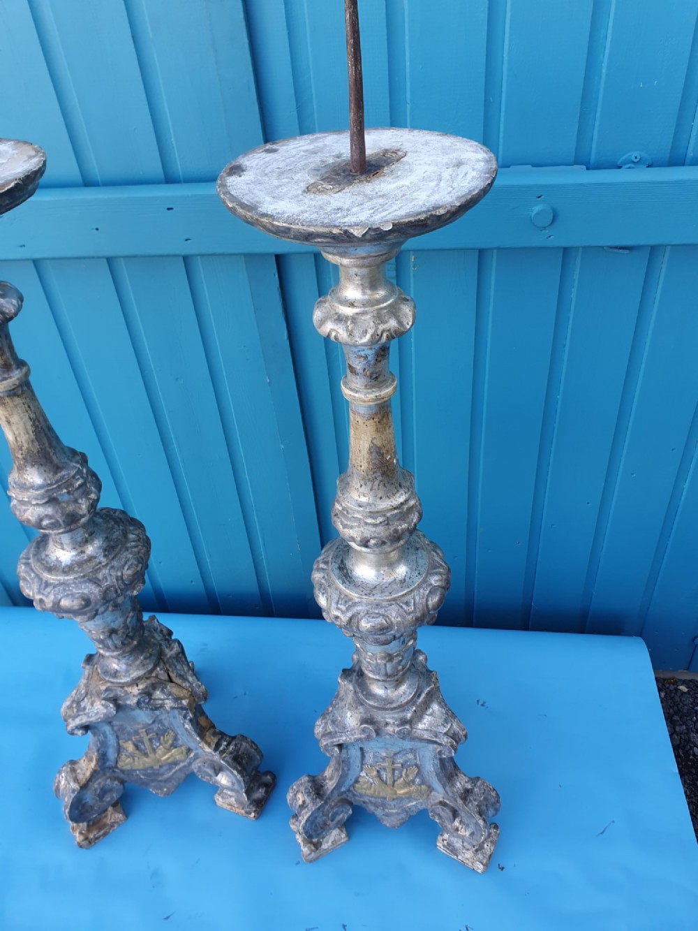 Pair of tall 18th-century Rococo gilt-silver pricket candlesticks with carved baluster shafts and scrolled triangular bases. View IX