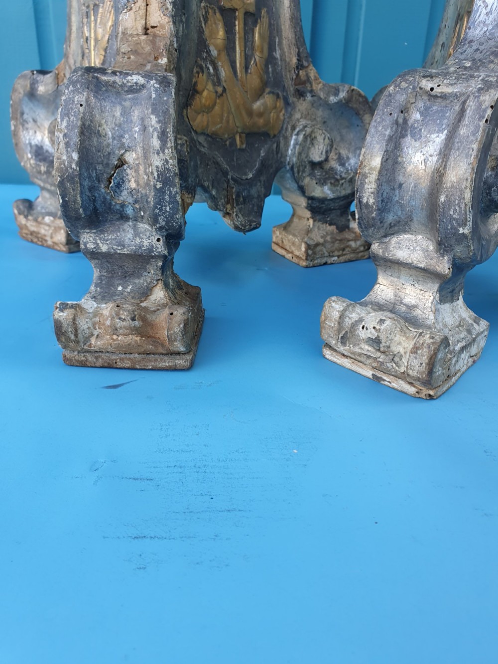 Pair of tall 18th-century Rococo gilt-silver pricket candlesticks with carved baluster shafts and scrolled triangular bases. View XI