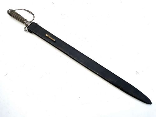 An early 18th-century short sword featuring a silvered hilt and ribbed grip, displayed alongside its black leather scabbard. View VI