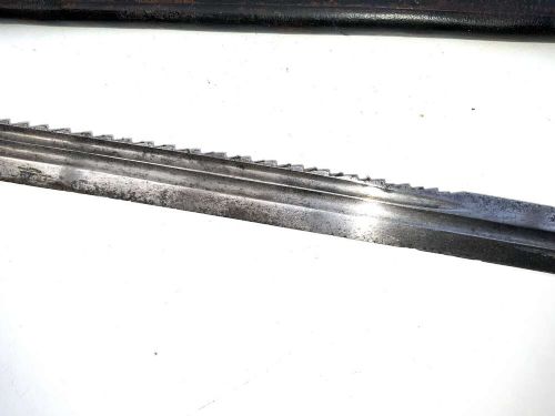 An early 18th-century short sword featuring a silvered hilt and ribbed grip, displayed alongside its black leather scabbard. View XIII