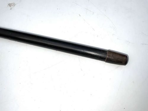 A black ebonised wooden walking stick featuring a curved crook handle, a silver-toned metal collar, and a protective tip. View III