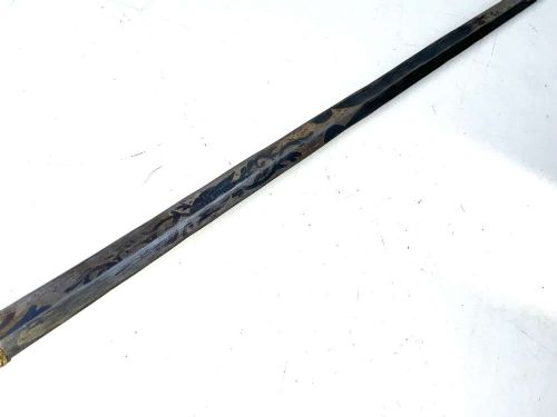 A tapered dark wooden swagger stick featuring a polished silver-toned metal pommel cap and a protective metal ferrule. View V