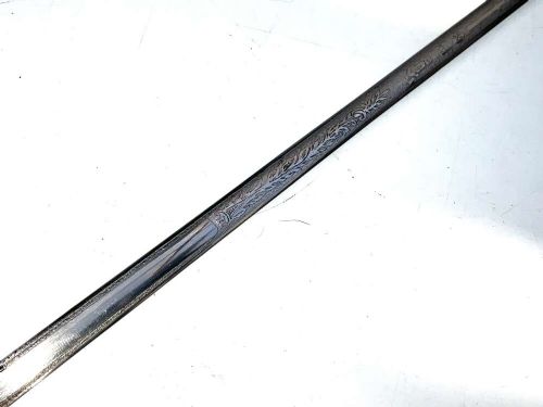 A Victorian dark wood walking cane featuring a decorative silver handle and a brass protective ferrule at the base. View VIII