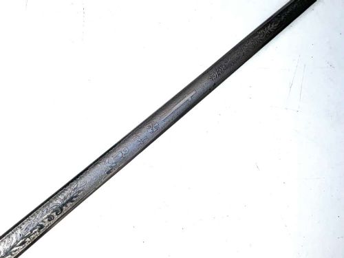 A Victorian dark wood walking cane featuring a decorative silver handle and a brass protective ferrule at the base. View IX