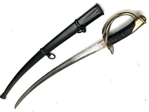 An antique 19th-century military cavalry sabre featuring a brass three-branch handguard, leather-wrapped grip, and black metal scabbard. View V