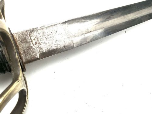 An antique 19th-century military cavalry sabre featuring a brass three-branch handguard, leather-wrapped grip, and black metal scabbard. View VII