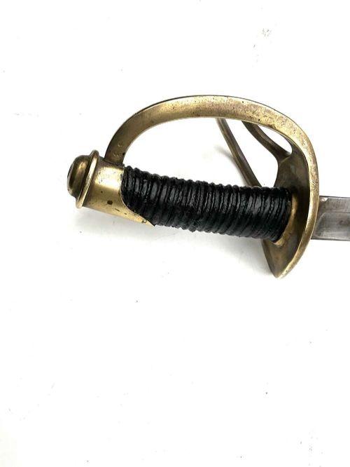 An antique 19th-century military cavalry sabre featuring a brass three-branch handguard, leather-wrapped grip, and black metal scabbard. View X