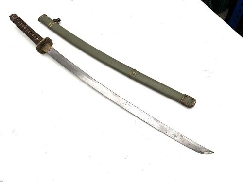 A Second World War Japanese officer sword in an olive green metal scabbard with brass fittings and a bound handle. View III