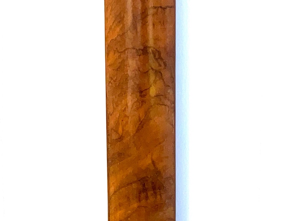 A wall-mounted antique Georgian stick barometer crafted from figured satinwood, featuring a brass finial, pediment top, and glass-fronted silvered scale. View IV