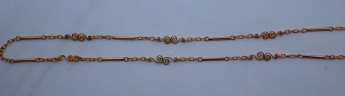 fig 3. An antique Victorian 9ct rose gold chain composed of alternating cylindrical bar links and coiled wirework scrolls.