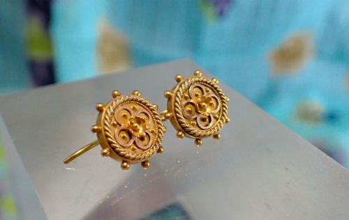 fig 1. A pair of Victorian 15ct gold circular stud earrings featuring Etruscan Revival wirework, bead granulation, and a central floral rosette.