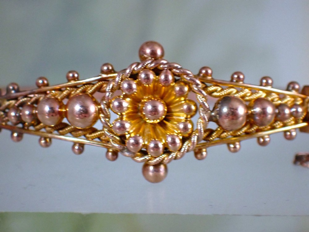 Reserved for James/ Antique Victorian 9ct rose gold Sunflower motif bangle