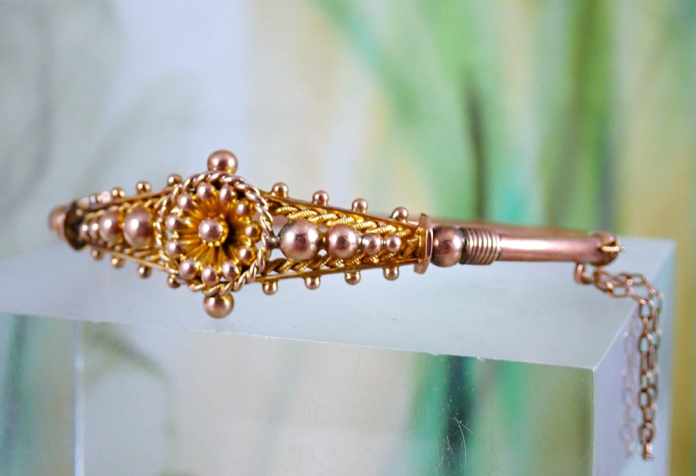 Reserved for James/ Antique Victorian 9ct rose gold Sunflower motif bangle View III
