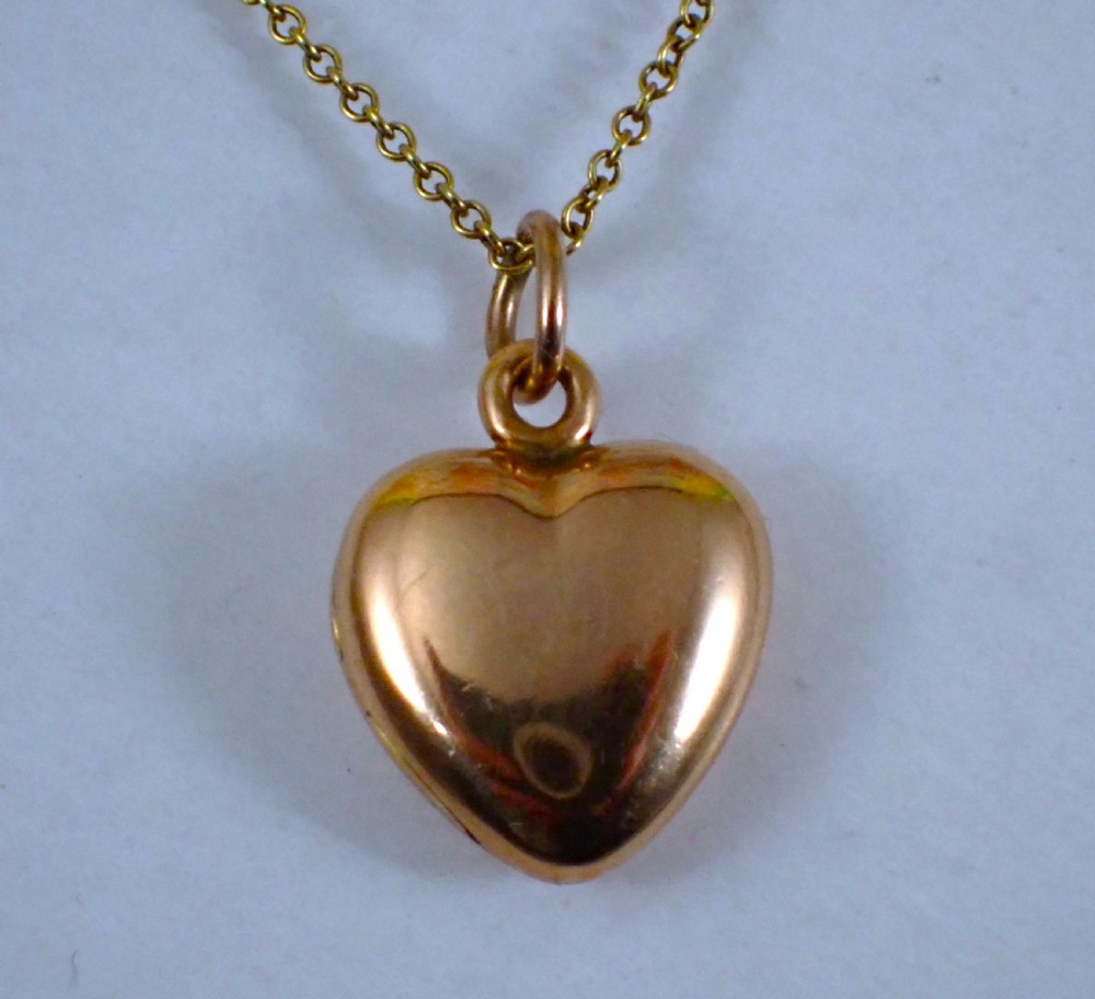 Antique Edwardian 15ct heart shape gold locket and chain