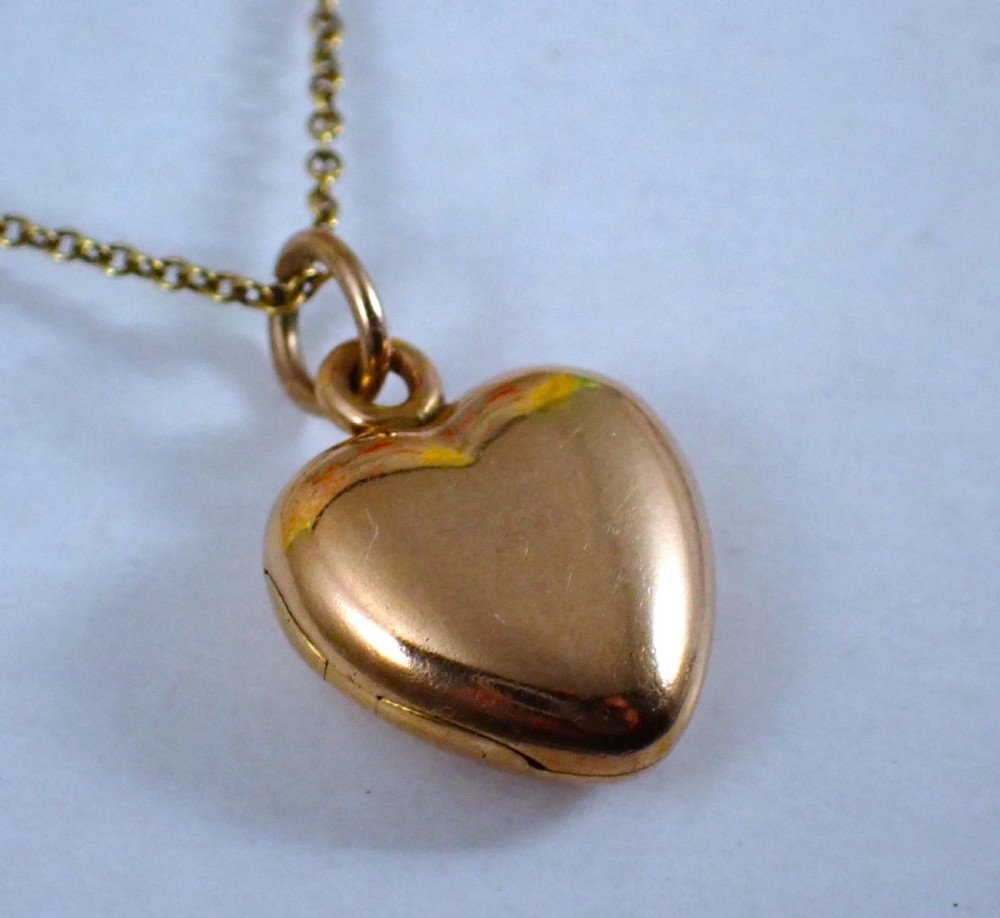 Antique Edwardian 15ct heart shape gold locket and chain View V