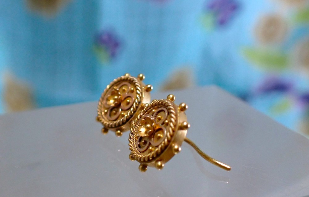 A pair of Victorian 15ct gold circular stud earrings featuring Etruscan Revival wirework, bead granulation, and a central floral rosette. View III