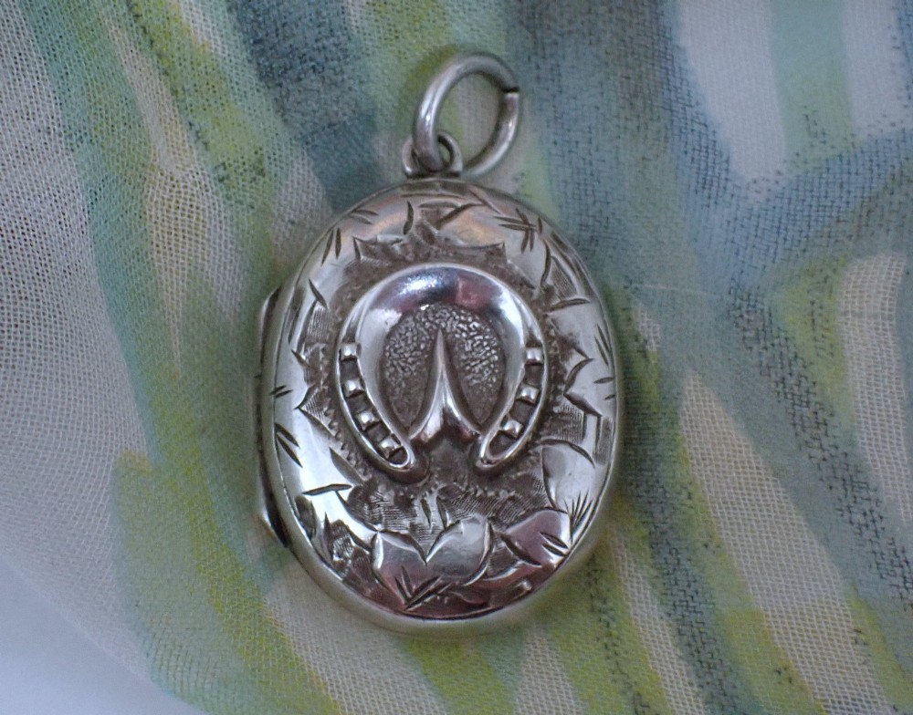 Antique Victorian Horseshoe motif Sterling silver locket pendant