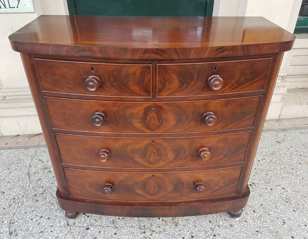   ANTIQUE BOW FRONTED CHEST  OF DRAWERS View II