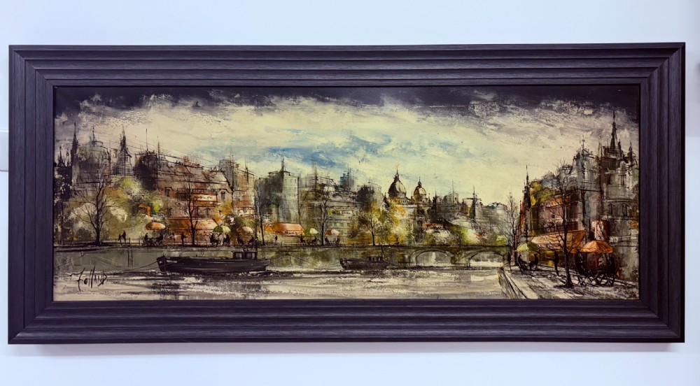 A panoramic oil painting depicting a Parisian cityscape along the River Seine with architectural buildings and street cafes, framed in a dark grey wooden moulding. View III