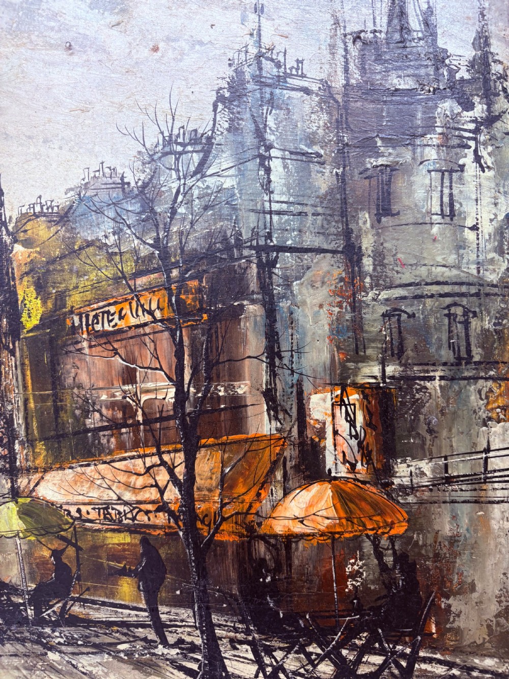 A panoramic oil painting depicting a Parisian cityscape along the River Seine with architectural buildings and street cafes, framed in a dark grey wooden moulding. View IV
