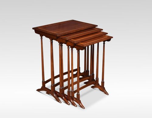Nest of Four Mahogany Inlaid Tables