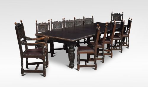 Carved Oak Dining Table and Chairs