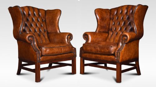 Pair of Leather Upholstered Wingback Armchairs