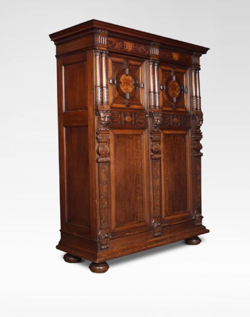 Carved Oak Two Door Inlaid Cupboard