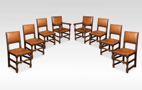 Eight Leather Upholstered Oak Dining Chairs