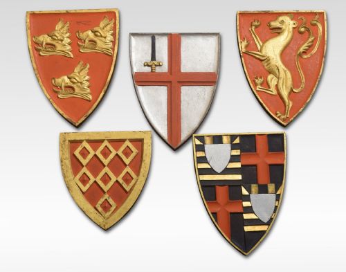 Five Carved Armorial Plaques