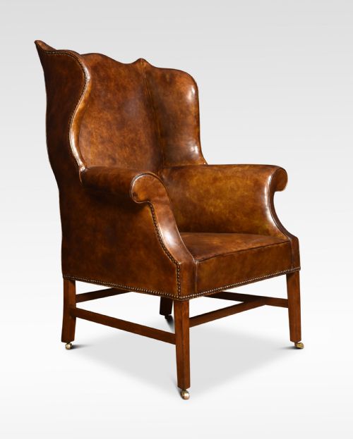 Brown Leather Upholstered Wingback Armchair