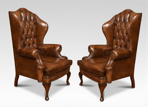 Pair of Leather Upholstered Wingback Armchairs