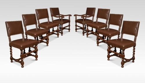 Eight Leather Upholstered Oak Dining Chairs