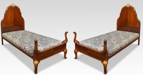Pair of Walnut and Parcel Gilt Beds