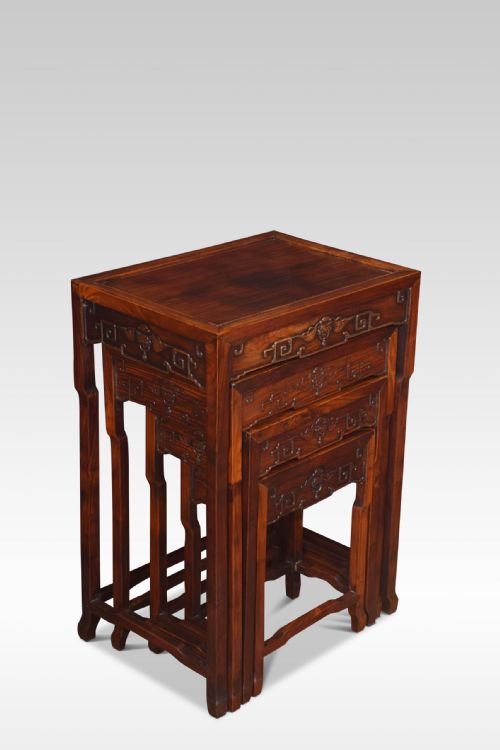 NEST OF FOUR GRADUATED ROSEWOOD TABLES - ADDITIONAL PHOTO 1