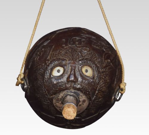 19TH CENTURY CARVED BUG BEAR COCONUT FLASK - ADDITIONAL PHOTO 1