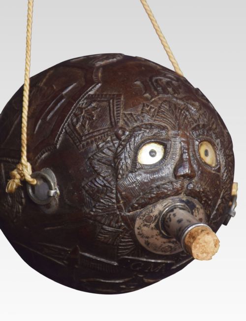 19TH CENTURY CARVED BUG BEAR COCONUT FLASK - ADDITIONAL PHOTO 2
