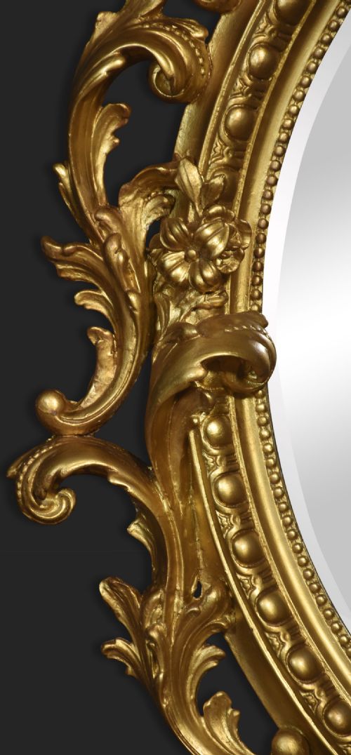 CARVED GILTWOOD OVAL WALL MIRROR - ADDITIONAL PHOTO 2