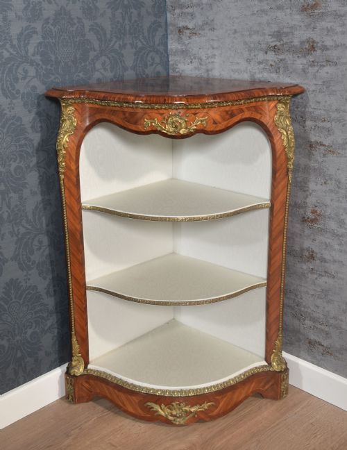 KINGWOOD ORMOLU MOUNTED CORNER CUPBOARD