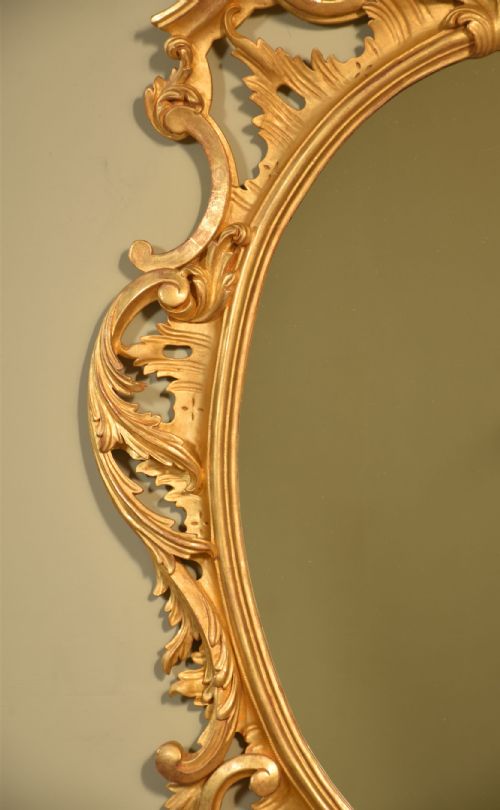 CARVED GILTWOOD OVAL WALL MIRROR - ADDITIONAL PHOTO 2