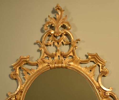 CARVED GILTWOOD OVAL WALL MIRROR - ADDITIONAL PHOTO 4