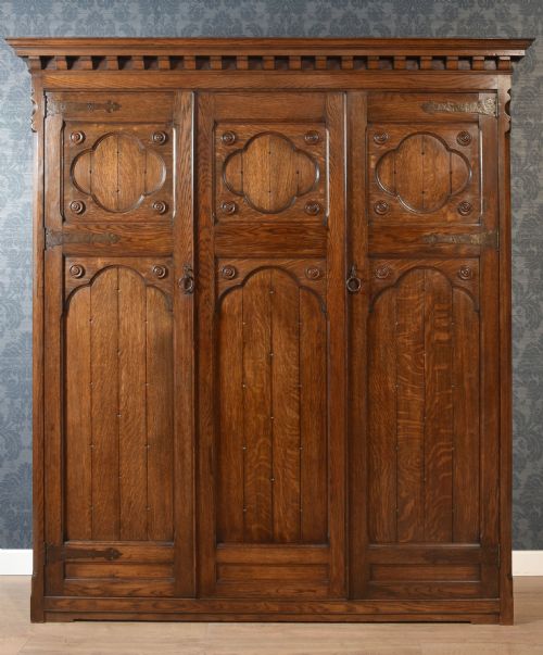 jacobean style carved oak three door wardrobe - CATEGORY: ANTIQUE WARDROBES - DATED 1910
